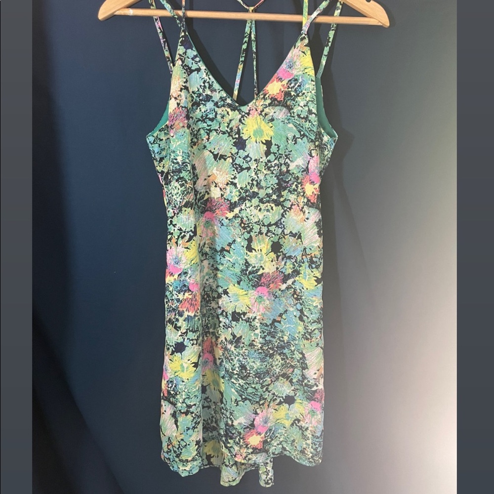 Gorgeous cocktail dress with cross back detail.